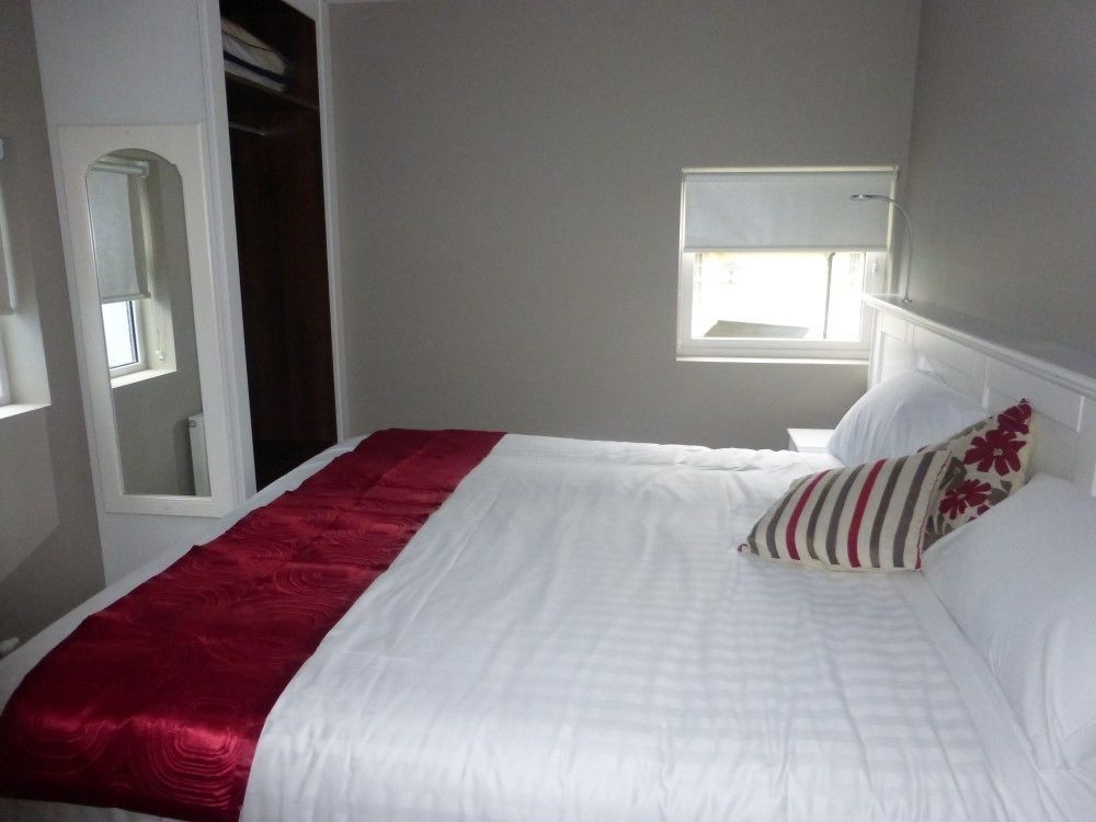 Ryan'S Hotel Конг Екстериор снимка